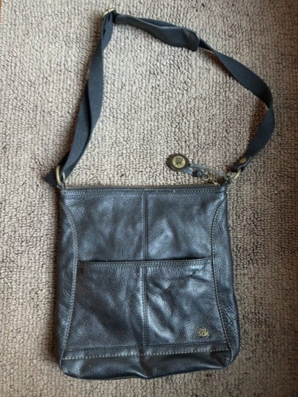 The Sak Iris pebbled leather crossbody bag purse black